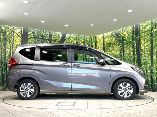 フリードハイブリッド ハイブリッド・Gホンダセンシング 純正9型ナビ 両側電動ドア 後席モニター バックカメラ 寒冷地仕様 衝突被害軽減装置 禁煙車 ドラレコ スマートキー LEDヘッド ETC2.0 オートライト オートエアコン Bluetooth(66枚目)