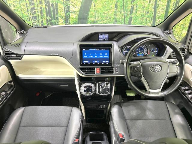 ノア ハイブリッドSi ダブルバイビー 禁煙車 後期型 12.1型後席モニター 純正9型ナビ 両側電動スライドドア バックカメラ 衝突被害軽減システム ハーフレザーシート スマートキー LEDヘッド ETC クルコン 純正16インチアルミ(2枚目)