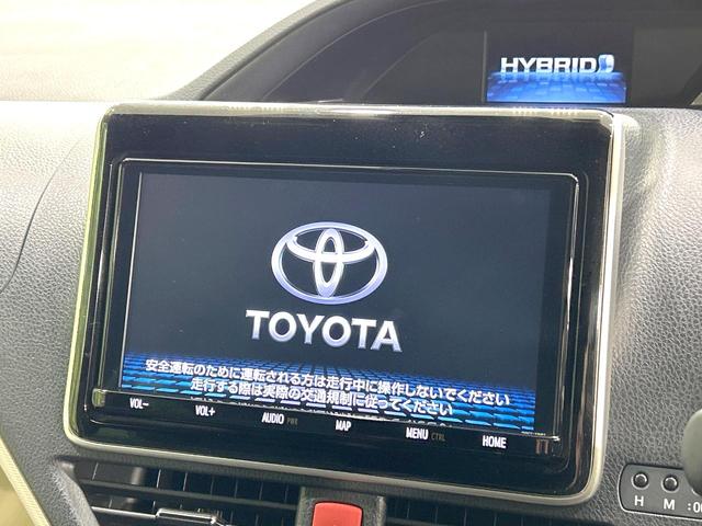 ノア ハイブリッドSi ダブルバイビー 禁煙車 後期型 12.1型後席モニター 純正9型ナビ 両側電動スライドドア バックカメラ 衝突被害軽減システム ハーフレザーシート スマートキー LEDヘッド ETC クルコン 純正16インチアルミ(4枚目)