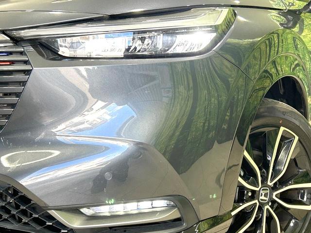 ヴェゼル ｅ：ＨＥＶ　ＰＬａＹ　パノラマルーフ　純正９型ナビ　全周囲カメラ　寒冷地仕様　ホンダセンシング　禁煙車　電動リアゲート　ハーフレザーシート　ドラレコ　スマートキー　コーナーセンサー　ＬＥＤヘッド　ＥＴＣ　純正１８インチＡＷ（12枚目）