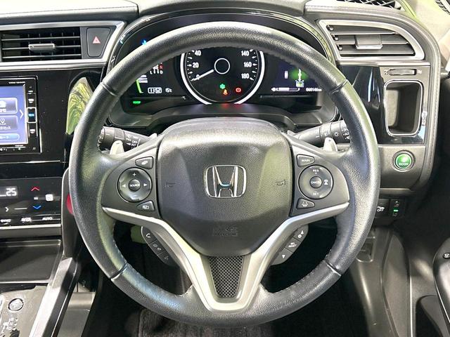 シャトル ハイブリッドＸ　ホンダセンシング　純正ナビ　バックカメラ　衝突被害軽減システム　禁煙車　ハーフレザーシート　スマートキー　ＬＥＤヘッド　ビルトインＥＴＣ　純正１５インチアルミ　車線逸脱警報　オートライト　デュアルエアコン（11枚目）