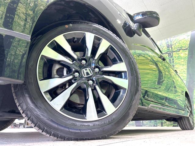 シャトル ハイブリッドＸ　ホンダセンシング　純正ナビ　バックカメラ　衝突被害軽減システム　禁煙車　ハーフレザーシート　スマートキー　ＬＥＤヘッド　ビルトインＥＴＣ　純正１５インチアルミ　車線逸脱警報　オートライト　デュアルエアコン（13枚目）