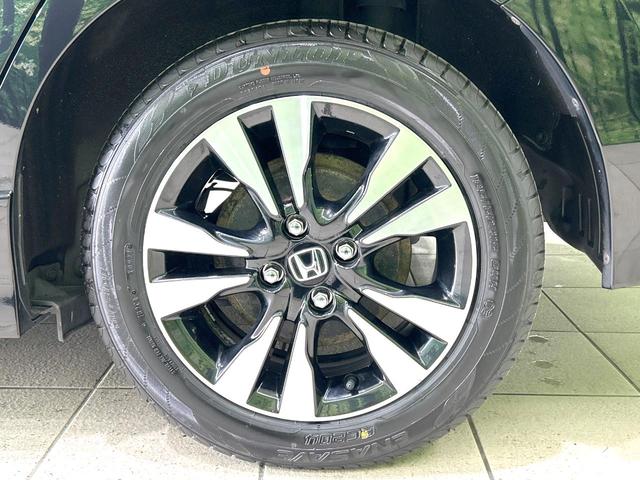 シャトル ハイブリッドＸ　ホンダセンシング　純正ナビ　バックカメラ　衝突被害軽減システム　禁煙車　ハーフレザーシート　スマートキー　ＬＥＤヘッド　ビルトインＥＴＣ　純正１５インチアルミ　車線逸脱警報　オートライト　デュアルエアコン（57枚目）