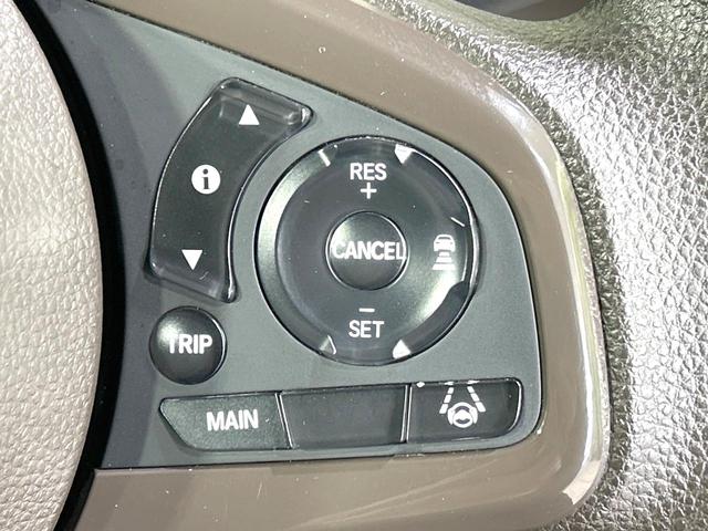 Ｎ－ＷＧＮ Ｌホンダセンシング　禁煙車　純正ナビ　アダプティブクルーズ　衝突軽減装置　バックカメラ　シートヒーター　ＥＴＣ　スマートキー　ドラレコ　オートライト　車線逸脱警報　盗難防止装置　プライバシーガラス　Ｂｌｕｅｔｏｏｔｈ再生（4枚目）