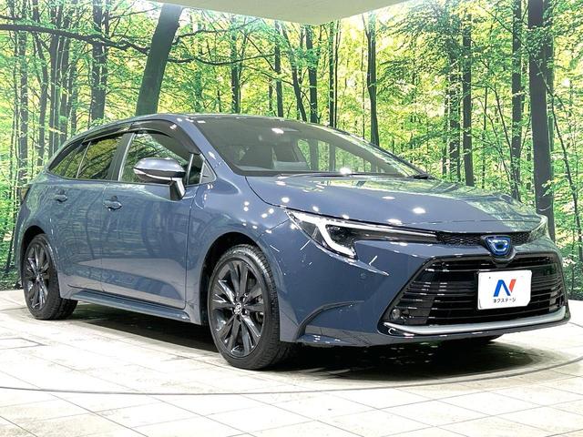 カローラツーリング ハイブリッド　ダブルバイビー　禁煙車　純正１０．５インチナビ　バックカメラ　衝突軽減装置　レーダクルーズ　シートヒーター　ステアリングヒーター　ＥＴＣ　スマートキー　ＬＥＤヘッド　革巻きステアリング　純正１７インチＡＷ（16枚目）