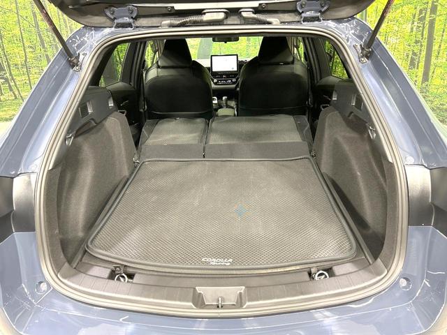 カローラツーリング ハイブリッド　ダブルバイビー　禁煙車　純正１０．５インチナビ　バックカメラ　衝突軽減装置　レーダクルーズ　シートヒーター　ステアリングヒーター　ＥＴＣ　スマートキー　ＬＥＤヘッド　革巻きステアリング　純正１７インチＡＷ（48枚目）