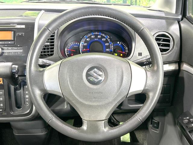 ワゴンＲスティングレー Ｘ　４ＷＤ　禁煙車　シートヒーター　スマートキー　オーディオ　オートエアコン　電動格納ミラー　ＨＩＤヘッド　純正１４インチＡＷ　革巻きステアリング　ベンチシート　盗難防止装置　プライバシーガラス（11枚目）