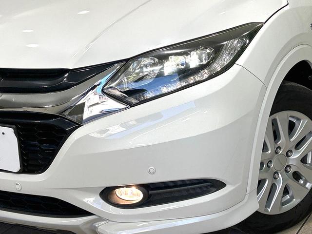 ヴェゼル ハイブリッドＺ　禁煙車　モデューロ１６インチホイール　茶内装　寒冷地仕様　ナビ　バックカメラ　衝突軽減装置　クルーズコントロール　シートヒーター　ＬＥＤヘッド　コーナーセンサー　ＥＴＣ　ルーフレール　フルセグ（13枚目）