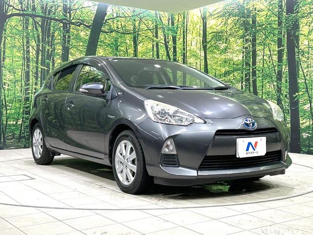 アクア Ｇ　禁煙車　ＳＤナビ　スマートキー　オートライト　オートエアコン　フルセグ　純正１５インチＡＷ　革巻きステアリング　プライバシーガラス　盗難防止装置　電動格納ミラー　ＤＶＤ／ＣＤ再生　横滑防止装置（16枚目）