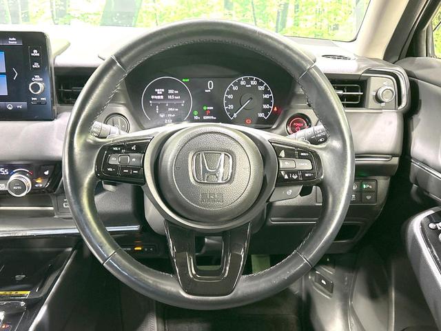 ヴェゼル e:HEV Z 禁煙車 純正9型ナビ バックカメラ 寒冷地仕様 衝突被害軽減装置 電動リアゲート ドラレコ コーナーセンサー スマートキー LEDヘッド ETC2.0 オートマチックハイビーム 車線逸脱警報 フルセグ(11枚目)