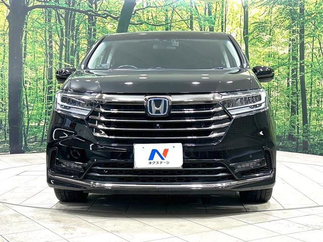 オデッセイハイブリッド ｅ：ＨＥＶアブソルート・ＥＸ　純正１０型ナビ　両側電動ドア　全周囲カメラ　１００Ｖ電源　ＨＤＭＩ　ホンダセンシング　禁煙車　電動リアゲート　ハーフレザー　ドラレコ　コーナーセンサー　シートヒーター　ＬＥＤヘッド　ＥＴＣ２．０（15枚目）