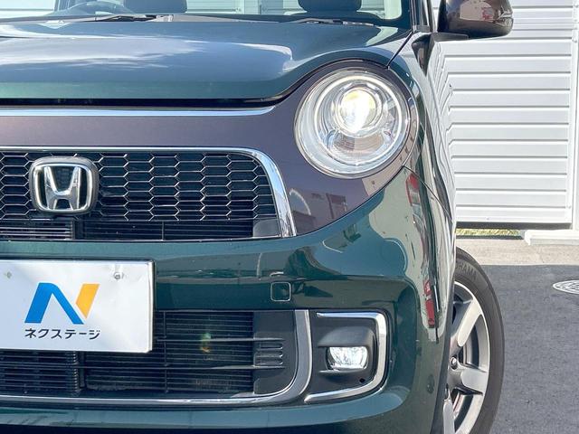 N-ONE プレミアムSSブラウンスタイルパッケージ 純正ナビ 地デジ バックカメラ Bluetooth HIDライト 前席シートヒーター クルーズコントロール 純正14インチアルミホイール 木目調インパネ スマートキー 禁煙(13枚目)