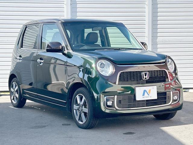 N-ONE プレミアムSSブラウンスタイルパッケージ 純正ナビ 地デジ バックカメラ Bluetooth HIDライト 前席シートヒーター クルーズコントロール 純正14インチアルミホイール 木目調インパネ スマートキー 禁煙(17枚目)