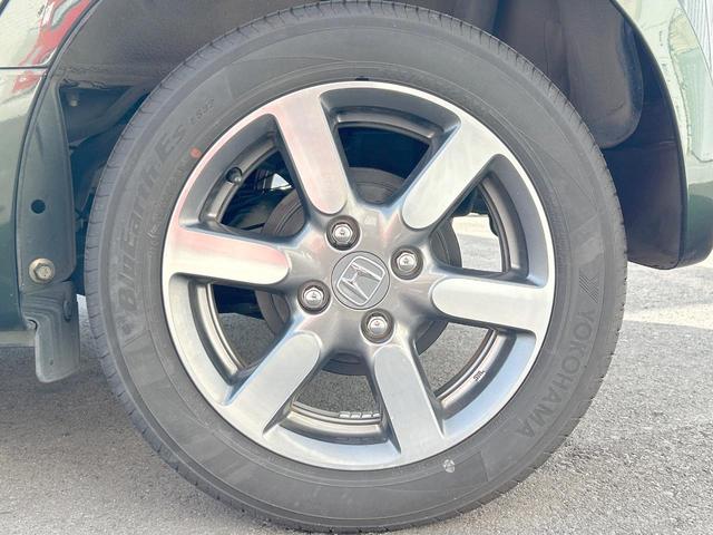 N-ONE プレミアムSSブラウンスタイルパッケージ 純正ナビ 地デジ バックカメラ Bluetooth HIDライト 前席シートヒーター クルーズコントロール 純正14インチアルミホイール 木目調インパネ スマートキー 禁煙(24枚目)