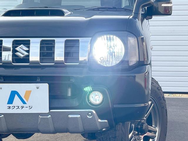 ジムニー クロスアドベンチャー　４ＷＤ　５速マニュアル　オープンカントリータイヤ　ヒーテッドドアミラー　シートヒーター　ＥＴＣ　オーディオ　ＬＥＤヘッドランプ　エアコン　フォグランプ　電動格納ミラー　純正革巻ステアリングホイール（12枚目）