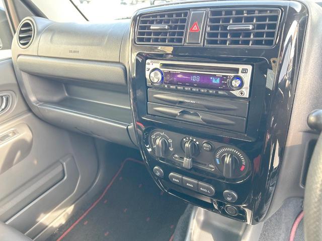 ジムニー クロスアドベンチャー　４ＷＤ　５速マニュアル　オープンカントリータイヤ　ヒーテッドドアミラー　シートヒーター　ＥＴＣ　オーディオ　ＬＥＤヘッドランプ　エアコン　フォグランプ　電動格納ミラー　純正革巻ステアリングホイール（21枚目）