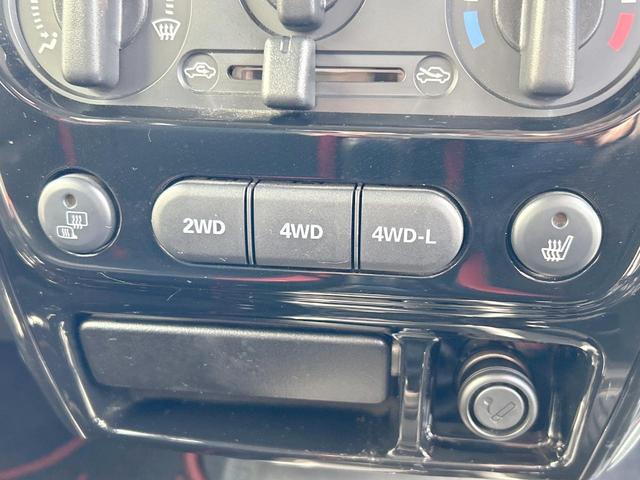 ジムニー クロスアドベンチャー　４ＷＤ　５速マニュアル　オープンカントリータイヤ　ヒーテッドドアミラー　シートヒーター　ＥＴＣ　オーディオ　ＬＥＤヘッドランプ　エアコン　フォグランプ　電動格納ミラー　純正革巻ステアリングホイール（23枚目）