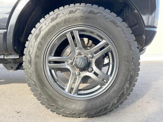 ジムニー クロスアドベンチャー　４ＷＤ　５速マニュアル　オープンカントリータイヤ　ヒーテッドドアミラー　シートヒーター　ＥＴＣ　オーディオ　ＬＥＤヘッドランプ　エアコン　フォグランプ　電動格納ミラー　純正革巻ステアリングホイール（46枚目）