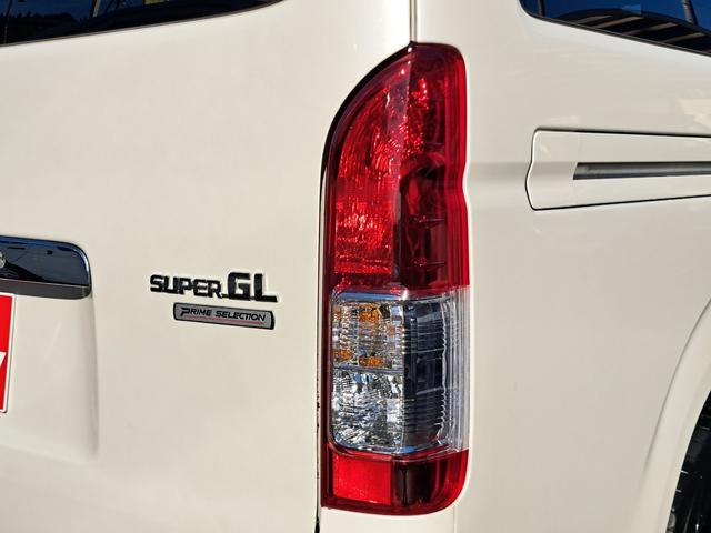 ハイエースバン ロングスーパーＧＬプライムセレ　４ＷＤディーゼルターボ　特別仕様車　寒冷地仕様　モデリスタスポイラー　社外１７インチアルミ　トヨタ純正ナビ・テレビ・バックカメラ　ウッドコンビステアリング　ＥＴＣ　キーレスエントリー　タイベル交換済み（24枚目）