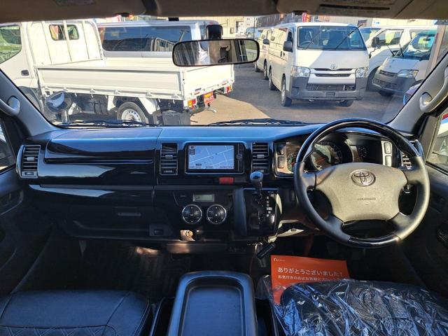 ハイエースバン ロングスーパーＧＬプライムセレ　４ＷＤディーゼルターボ　特別仕様車　寒冷地仕様　モデリスタスポイラー　社外１７インチアルミ　トヨタ純正ナビ・テレビ・バックカメラ　ウッドコンビステアリング　ＥＴＣ　キーレスエントリー　タイベル交換済み（35枚目）