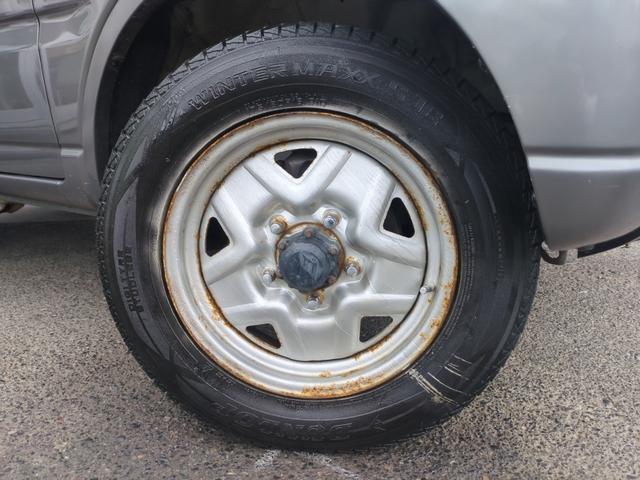 ジムニー ワイルドウインド　切替４ＷＤ　ターボ（車検令和８年９月・保証１年付）基本装備フル装備　純正ＣＤオーディオ　電格ミラー　フロア４ＡＴ　ＡＢＳ　純正１６インチＡＷスタッドレスタイヤ装着済　タイミングチェーンエンジン（4枚目）