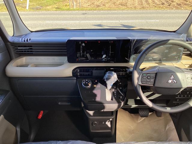 デリカミニ Ｔ　プレミアム　マイパイロット　マルチアラウンドモニター　　両側電動スライドドア　オートエアコン　リアサーキュレーター　電動パーキング　シートバックテーブル　撥水シート　１５インチアルミ（7枚目）