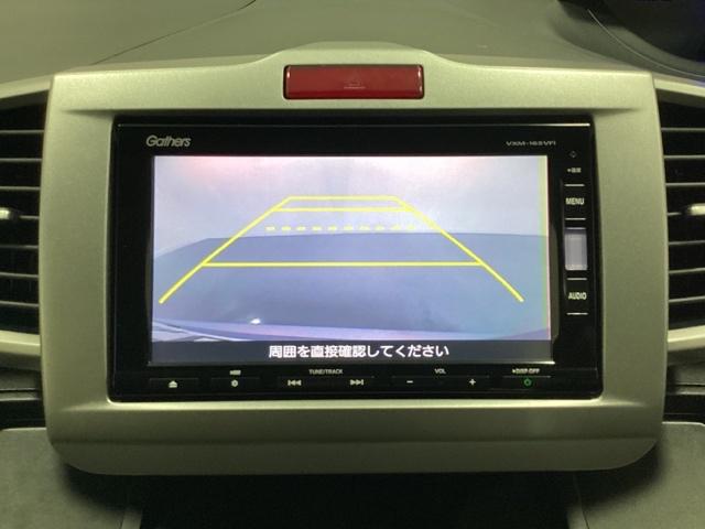 フリードハイブリッド ジャストセレクション　光触媒抗菌消臭施工済　ナビテレビ　セキュリティー　横滑り防止機能　オートクルーズ　地デジ　エアバック　ウォークスルー　ＤＶＤ再生可能　キーレスエントリー　ＰＳ　ＥＴＣ　３列　フルオートエアコン　ＡＢＳ（7枚目）