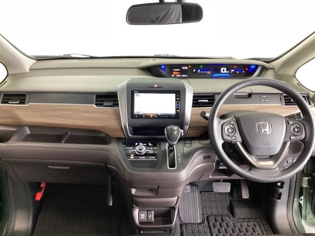 フリード G・ホンダセンシング ワンオーナー 6人乗り メモリーナビ DVD再生 CD ETC 光触媒抗菌消臭施工済 Fセグ 追突被害軽減ブレーキ iストップ Wエアバッグ パワーウィンドウ 1オ-ナ- スマートキ VSA エアコン(5枚目)