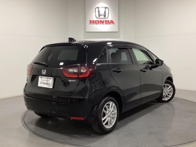 フィット e:HEVホーム フルセグTV バックカメラ 光触媒抗菌消臭施工済 前後誤発進抑制機能 クリソナ 助手席エアバッグ 運転席エアバッグ 1オナ アイドリングストップ LEDライト USB接続 ABS サイドエアバッグ(3枚目)