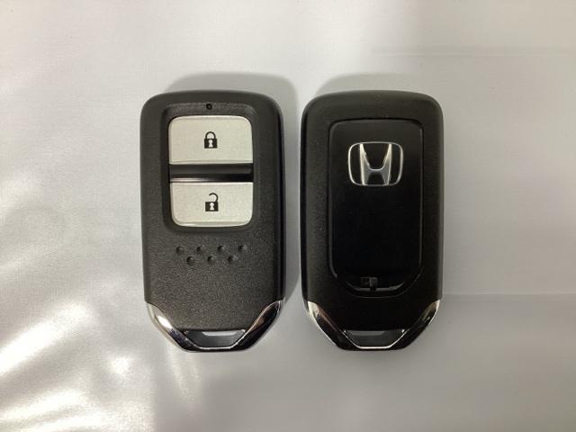 ヴェゼル X・ホンダセンシング 光触媒抗菌消臭施工済 シートヒーター Rカメラ Wエアバッグ 盗難防止 アクティブクルーズコントロール オートエアコン LEDランプ 衝突軽減ブレ-キ パワステ カーテンエアバック USBポート(12枚目)