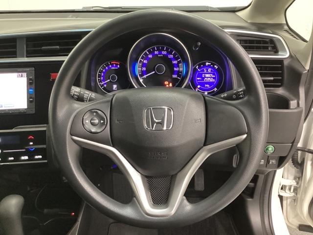 フィット １３Ｇ・Ｆパッケージファインエディション　ワンオーナー　フルセグＴＶ　ＤＶＤ再生　バックカメラ　リモコンエンジンスターター付　光触媒抗菌消臭施工済　インテリキー　１オ－ナ－　イモビライザー　ＡＵＴＯエアコン　Ｒカメラ　横滑り防止装置　キーレス（11枚目）