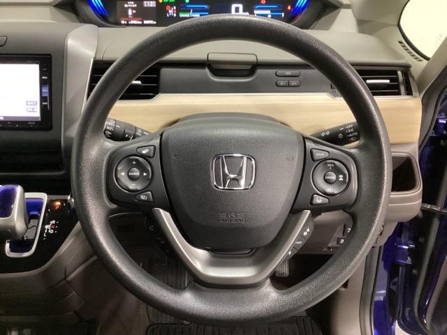 フリードハイブリッド ハイブリッド・Ｇホンダセンシング　６人乗り　ワンオーナー　フルセグＴＶ　ＤＶＤ再生　ＥＴＣ　光触媒抗菌消臭施工済　軽減ブレーキ　キーフリーシステム　１オ－ナ－　ＥＣＯＮ　後カメラ　Ａクルーズ　ＬＥＤヘッドランプ　横滑防止　３列シート（11枚目）