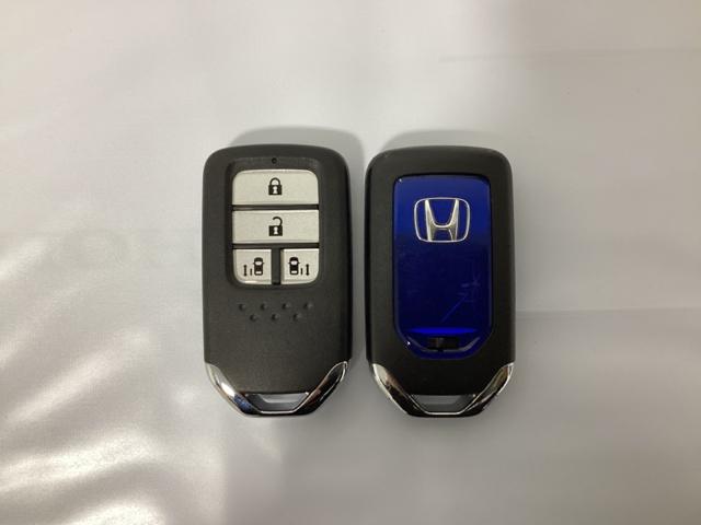 フリードハイブリッド ハイブリッド・Ｇホンダセンシング　６人乗り　ワンオーナー　フルセグＴＶ　ＤＶＤ再生　ＥＴＣ　光触媒抗菌消臭施工済　軽減ブレーキ　キーフリーシステム　１オ－ナ－　ＥＣＯＮ　後カメラ　Ａクルーズ　ＬＥＤヘッドランプ　横滑防止　３列シート（12枚目）