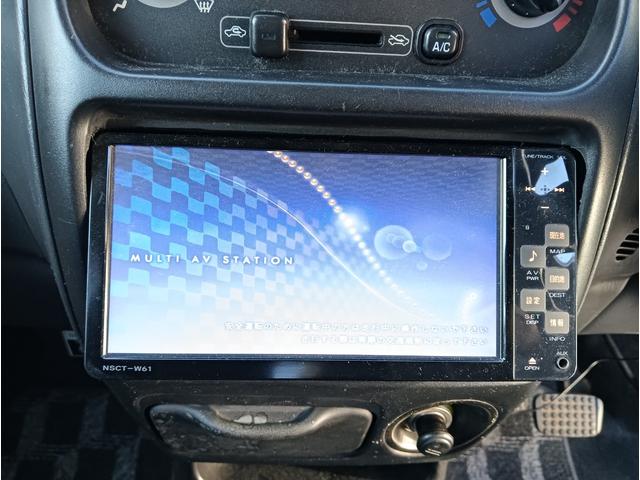 ムーヴ カスタムＬ　車検令和８年１２月１９日　後期モデル　４ＷＤ　禁煙車　ナビ　テレビ　純正オプション天井スピーカー　エンジンスターター　１３インチアルミ　キーレス　４ＡＴ　エアコン　パワステ　チップアップシート（15枚目）