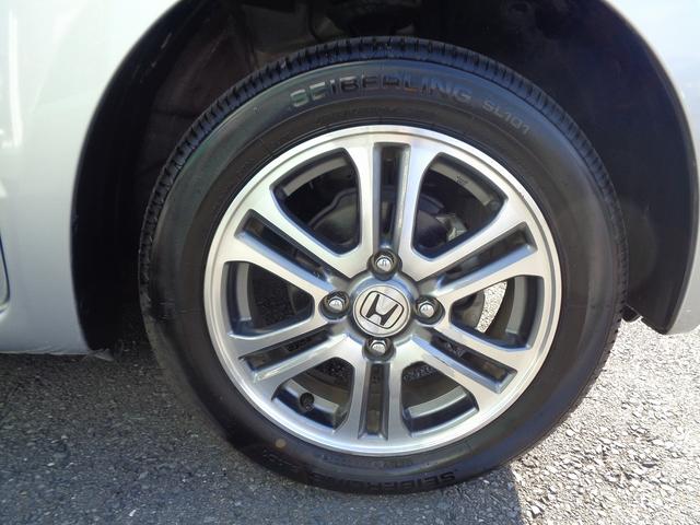 Ｎ－ＢＯＸ Ｇ・Ｌパッケージ　整備付　左電動ドア　純正メモリーナビＴＶ　ＣＤ　ＤＶＤ　ブル－トゥ－ス　スマ－トキ－プッシュスタ－ト　横滑り防止　フルオ－トＡＣ　ＥＴＣ　純正アルミ　アイドリングストップ　電格ドアミラ－（11枚目）