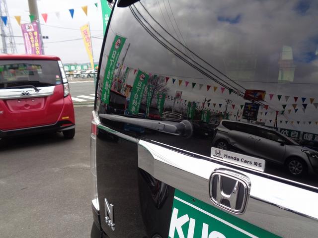 Ｎ－ＢＯＸ Ｇ・Ｌパッケージ　車検整備付　左電動ドア　純正メモリーナビＴＶ　バックカメラ　ＣＤ　ブル－トゥ－ス　スマ－トキ－Ｐスタ－ト　車高調ロ－ダウン　社外マフラー　横滑り防止　アイドリングストップ　社外ＡＷ　リアサンシェ－ド（16枚目）