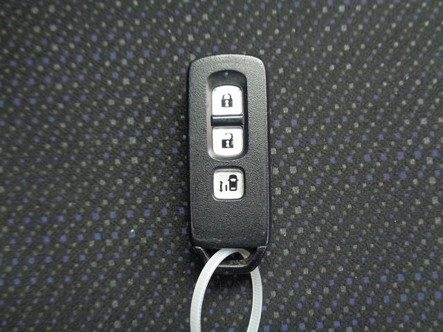 Ｎ－ＢＯＸ Ｇ・Ｌパッケージ　車検整備付　左電動ドア　純正メモリーナビＴＶ　バックカメラ　ＣＤ　ブル－トゥ－ス　スマ－トキ－Ｐスタ－ト　車高調ロ－ダウン　社外マフラー　横滑り防止　アイドリングストップ　社外ＡＷ　リアサンシェ－ド（35枚目）