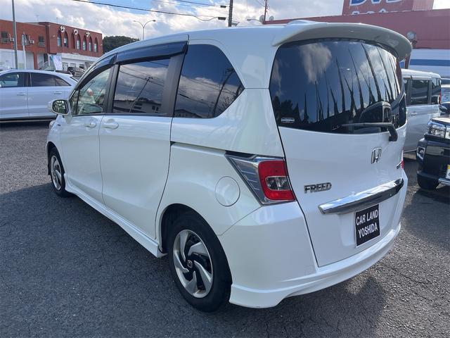 フリードハイブリッド ハイブリッド プレミアムエディション ハイブリッドプレミアムエディション CVT アイドリングストップ キーレスエントリー スマートキー 両側電動スライドドア ナビ バックカメラ 前方ドライブレコーダー フリップダウンモニター(8枚目)