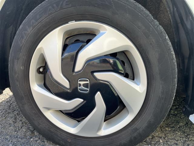 フリードハイブリッド ハイブリッド プレミアムエディション ハイブリッドプレミアムエディション CVT アイドリングストップ キーレスエントリー スマートキー 両側電動スライドドア ナビ バックカメラ 前方ドライブレコーダー フリップダウンモニター(10枚目)