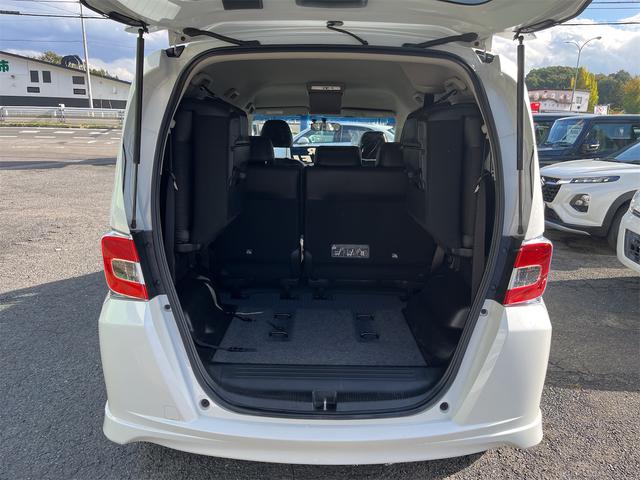 フリードハイブリッド ハイブリッド プレミアムエディション ハイブリッドプレミアムエディション CVT アイドリングストップ キーレスエントリー スマートキー 両側電動スライドドア ナビ バックカメラ 前方ドライブレコーダー フリップダウンモニター(18枚目)