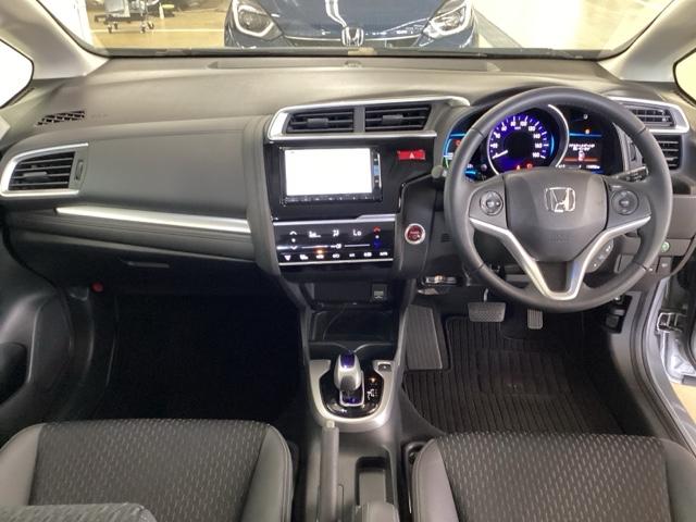 フィットハイブリッド Ｌパッケージ　光触媒抗菌消臭施工済　ナビ　ＥＴＣ　ＡＷＤ　イモビライザー　キーフリー　ＰＳ　地デジ　クルーズコントロール　ＰＷ　アイドリングストップ　ＡＢＳ　エアバッグ　オートエアコン　インテリキー　Ｂモニター（5枚目）