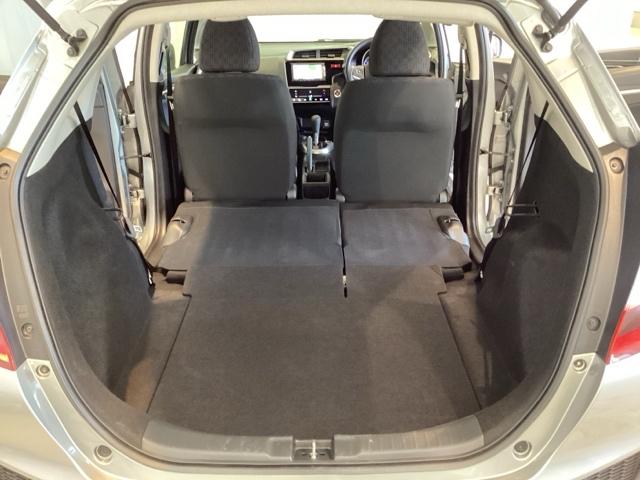 フィット １３Ｇ・Ｆパッケージ　光触媒抗菌消臭施工済　ナビ　ＥＴＣ　ワンセグＴＶ　エコアイドル　キーレスエントリー　スマートキーシステム　横滑り防止　バックモニター　ＤＶＤ再生機能　盗難防止システム　マニュアルエアコン　４ＷＤ（20枚目）