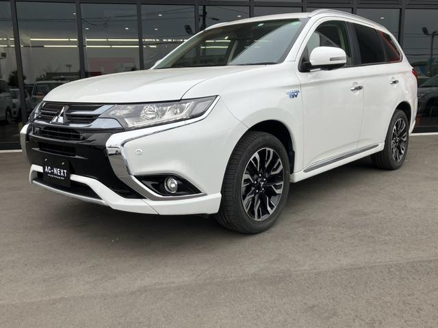アウトランダーＰＨＥＶ 　純正７型ナビ　衝突被害軽減ブレーキ　車線逸脱警報　レーダークルーズコントロール　全方位モニター　パワーバックドア　ＬＥＤヘッドライト　ステアリングヒーター　ＡＣ１００Ｖ　パドルシフト　充電ケーブル（35枚目）