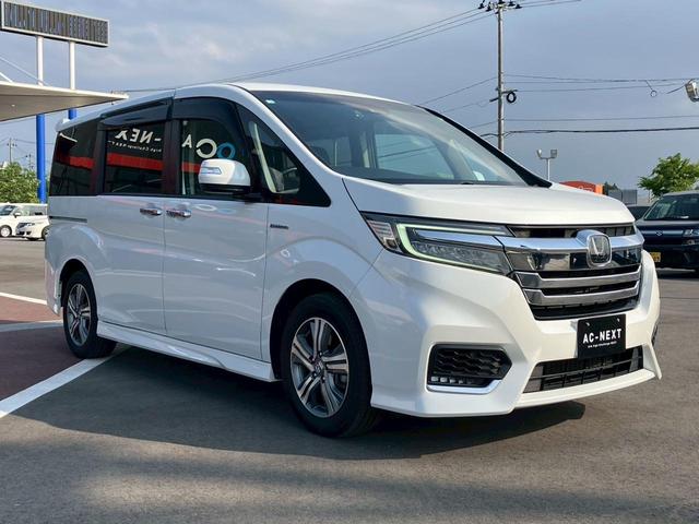 ステップワゴン スパーダ　ハイブリッド　Ｇ　ＥＸ　ホンダセンシング　ホンダセンシング　純正１０インチナビ　ＯＰエンジンスターター　アダプティブクルーズコントロール　レーンキープ　純正ドラレコ　Ｗエアコン　ＥＴＣ　シートヒーター　両側電動スライドドア　ハーフレザーシート（21枚目）