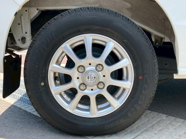 エブリイ ＰＣリミテッド　４ＷＤ　１オーナー　衝突軽減ブレーキ　ふらつき警報機能　オートライト　ハイビームアシスト　ヘッドライトレベライザー　障害物センサー　ポータブルナビ　ーディオ　電動格納ミラー　１２インチＡＷ　横滑り防止（30枚目）