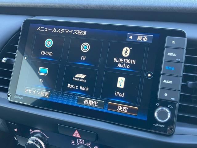 フィット ｅ：ＨＥＶリュクス　純正９インチナビ　フルセグＴＶ　Ｂカメラ　Ｂｌｕｅｔｏｏｔｈ　ＣＤ　ＤＶＤ　ハーフレザーシート　シートヒーター　ＬＥＤヘッドライト　アダプティブクルーズコントロール　レーンキープ　純正１６インチＡＷ（12枚目）