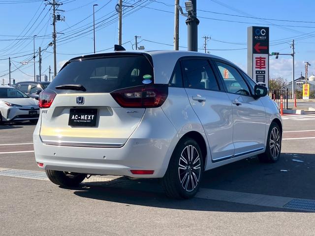 フィット ｅ：ＨＥＶリュクス　純正９インチナビ　フルセグＴＶ　Ｂカメラ　Ｂｌｕｅｔｏｏｔｈ　ＣＤ　ＤＶＤ　ハーフレザーシート　シートヒーター　ＬＥＤヘッドライト　アダプティブクルーズコントロール　レーンキープ　純正１６インチＡＷ（21枚目）