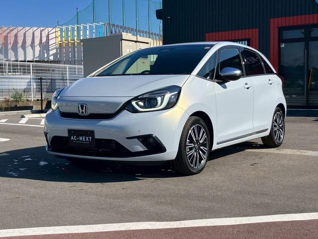 フィット ｅ：ＨＥＶリュクス　純正９インチナビ　フルセグＴＶ　Ｂカメラ　Ｂｌｕｅｔｏｏｔｈ　ＣＤ　ＤＶＤ　ハーフレザーシート　シートヒーター　ＬＥＤヘッドライト　アダプティブクルーズコントロール　レーンキープ　純正１６インチＡＷ（30枚目）