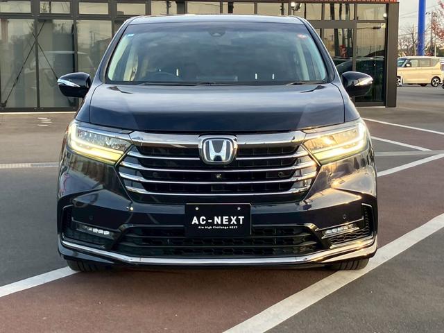 オデッセイハイブリッド ｅ：ＨＥＶアブソルート・ＥＸ　純正１０インチナビ　全周囲カメラ　フルセグＴＶ　Ｂｌｕｅｔｏｏｔｈ　純正後部座席モニター　ＡＣＣ　ドラレコ　両側電動スライドドア　パワーバックドア　Ｐシート　シートヒーター　Ｐアシスト　オットマン（4枚目）