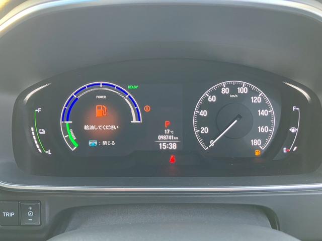 オデッセイハイブリッド ｅ：ＨＥＶアブソルート・ＥＸ　純正１０インチナビ　全周囲カメラ　フルセグＴＶ　Ｂｌｕｅｔｏｏｔｈ　純正後部座席モニター　ＡＣＣ　ドラレコ　両側電動スライドドア　パワーバックドア　Ｐシート　シートヒーター　Ｐアシスト　オットマン（8枚目）